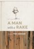 A_man_with_a_rake